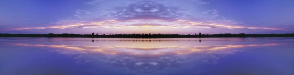Mirror Image Of Medicine Lake Alberta Canada Canvas Art - Darwin Wiggett  Design Pics (44 x 11)