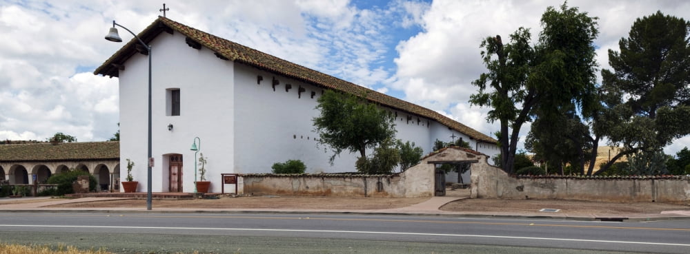 Mission San Miguel church at roadside San Miguel San Luis Obispo County California USA Canvas Art - Panoramic Images (27 x 9)
