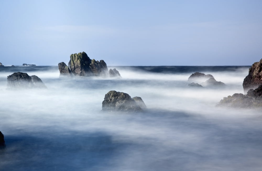 Mist Surrounding Big Rocks In The Water Northumberland England Canvas Art - John Short Design Pics (38 x 24)
