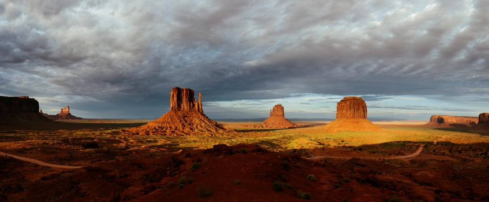 Mittens and Merrick Butte Monument Valley Monument Valley Tribal Park Utah USA Canvas Art - Panoramic Images (13 x 30)