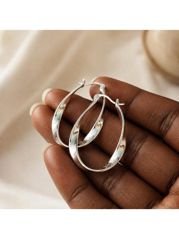 Mobius Twist Hoop Earrings Silver Sculptural Polished Lightweight Hinged Closure Statement Jewelry For Everyday Wear
