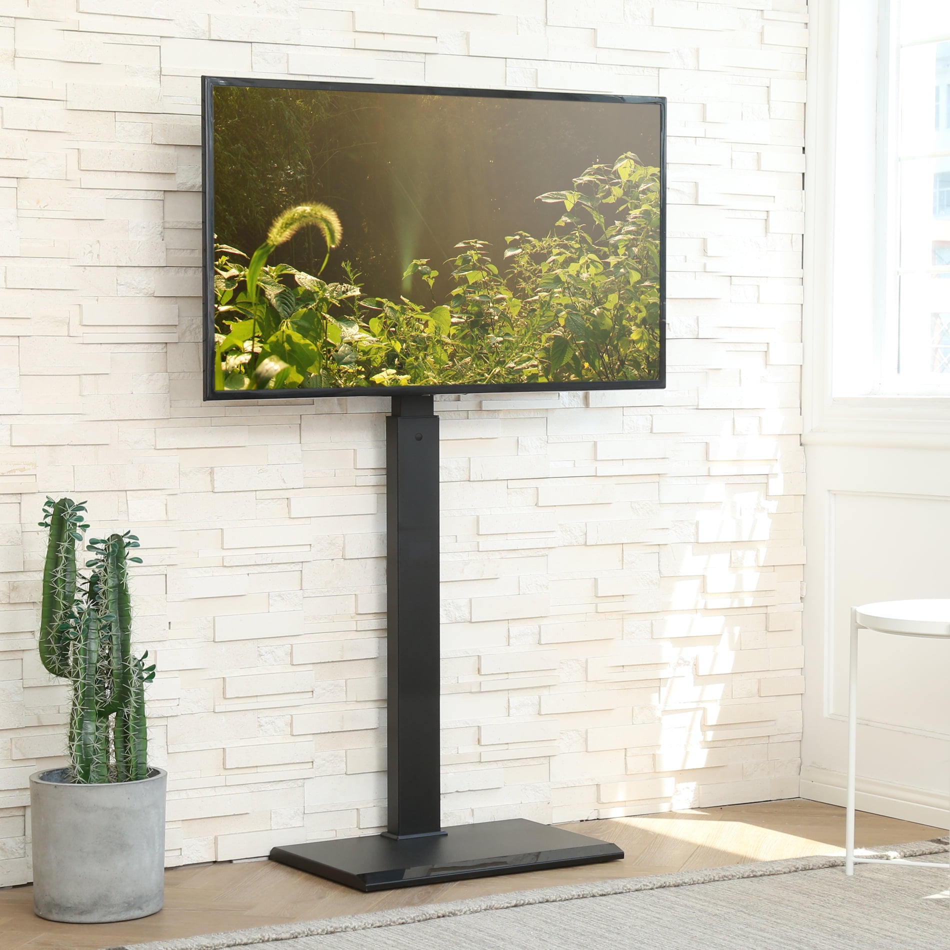 https://i5.walmartimages.com/seo/Modern-Floor-TV-Stand-up-to-55-inch-TV-Black-Television-Stand-with-Swivel-Mount-Base-Height-Adjustment-for-23-55-Inches-LED-LCD-Flat-Screen-TVs_81f0e8e1-a5bd-4d94-bf4c-6776080f17a7.ac95e3bdaed767d09bf6d9ac862b6f5c.jpeg