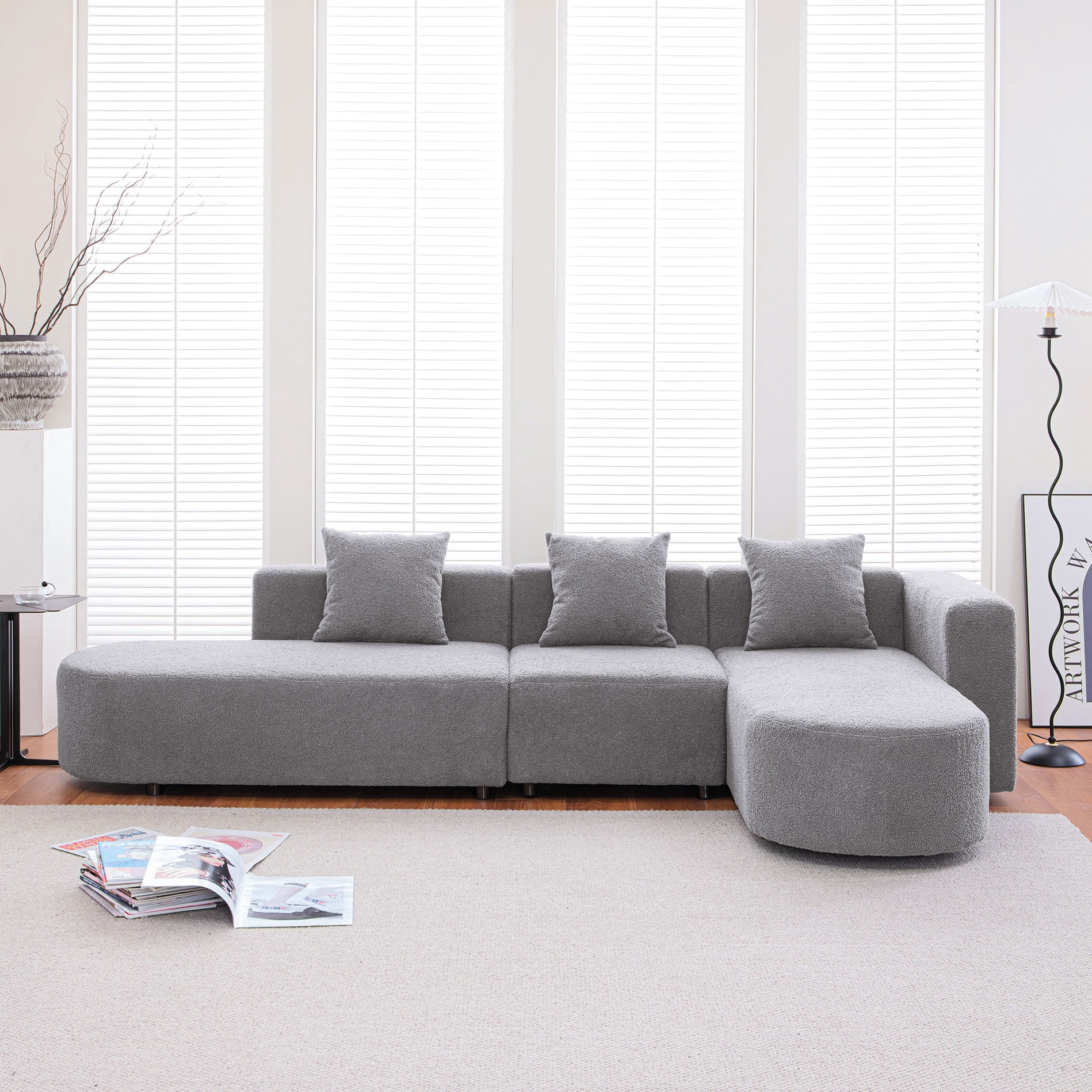 Modern gray L shape sofa with right facing curved seat offers a — free download