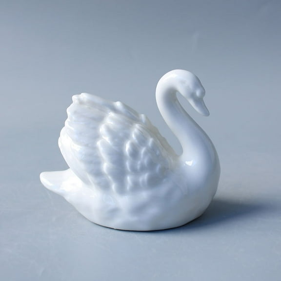 Modern minimalist black and white swan ceramic figurines for couples, a wedding gift, home decor, and wedding room decoration.