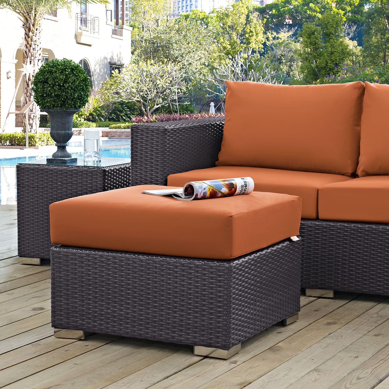 Versatile Espresso Orange Outdoor Ottoman with Synthetic Rattan Weave