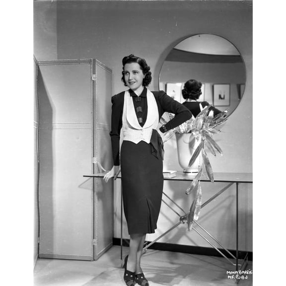 Mona Bari on a Dress and a Vest posed and smiling Photo Print (8 x 10)