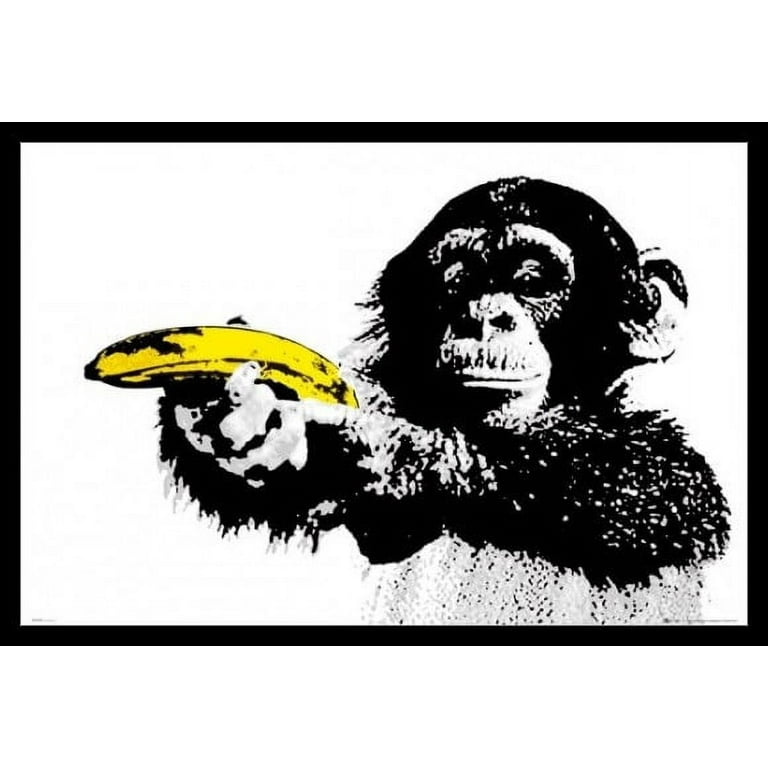 Monkey Pointing a Banana Laminated & Framed Poster (36 x 24) | Poster
