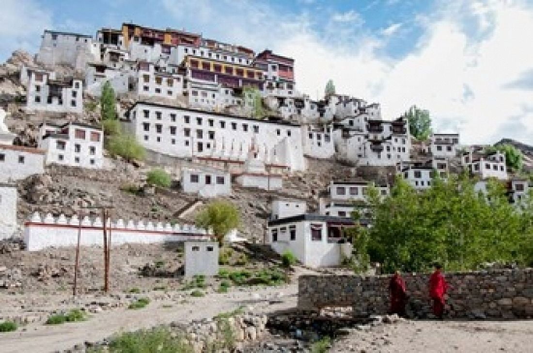 Monks standing in front of the Thiksey Monastery Leh Ledakh India Canvas Art - Ellen Clark DanitaDelimont (24 x 36)