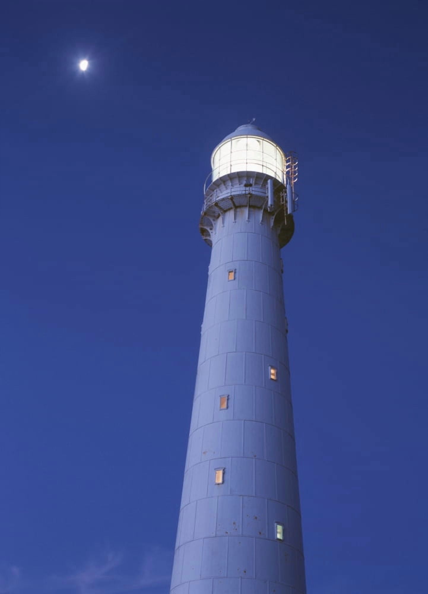 Moon Above Lighthouse At Dusk Canvas Art - Ian Cumming Design Pics (13 x 18)