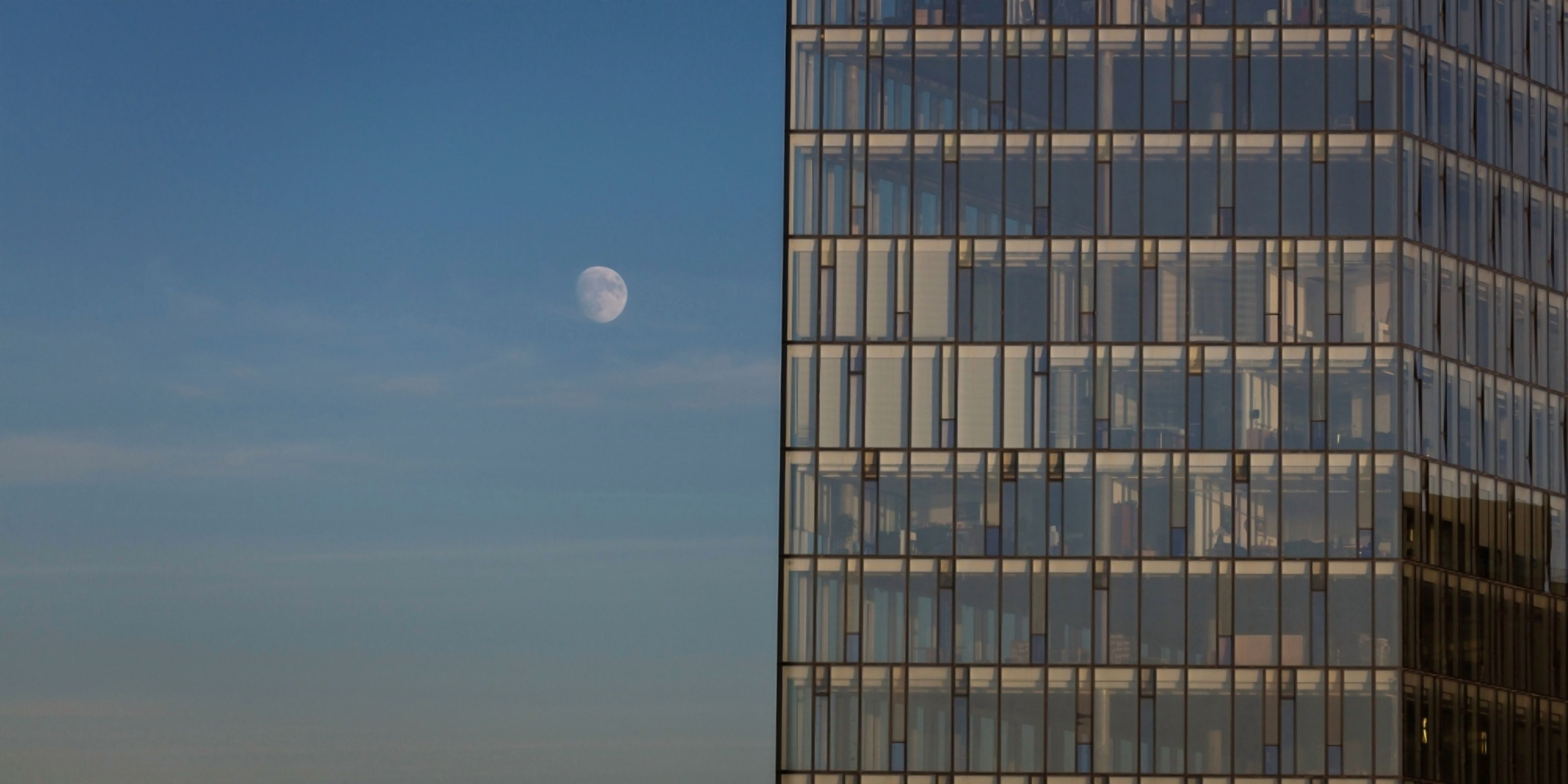 Moon and glass building Reykjavik Iceland Canvas Art - Panoramic Images (12 x 36)