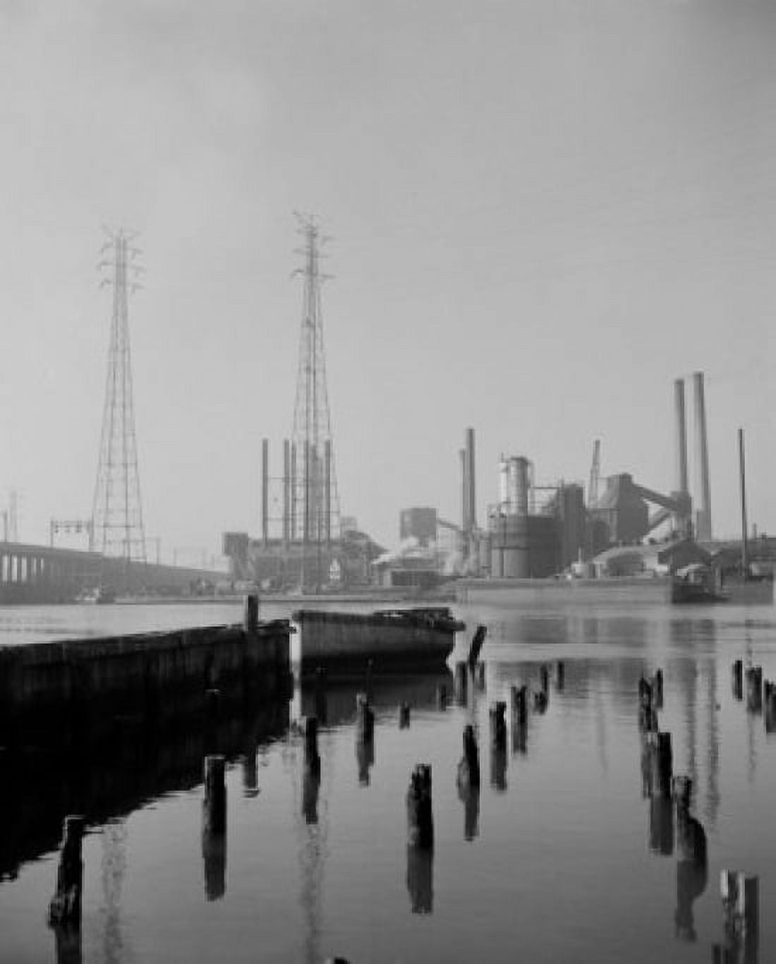 Moored rowing boat factory in the background Canvas Art - (18 x 24)