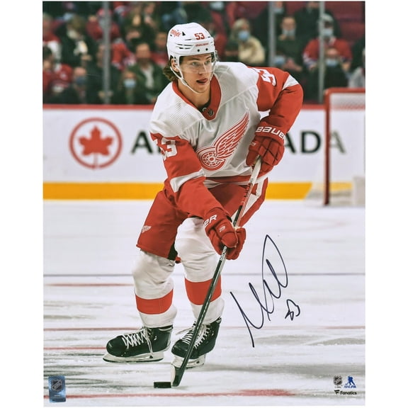Moritz Seider Detroit Red Wings Autographed 16" x 20" Skating with Puck Photograph - Fanatics Authentic Certified