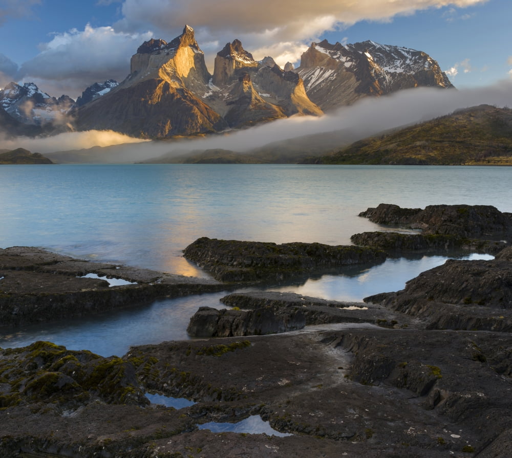 Morning clouds over the peaks of the Cuernos del Paine and Lake Pehoe Torres Del Paine National Park Chile Canvas Art - Panoramic Images (24 x 24)