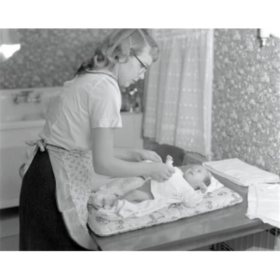 Mother Changing 5 Week Old Babys Diaper Poster Print - 18 x 24 in.