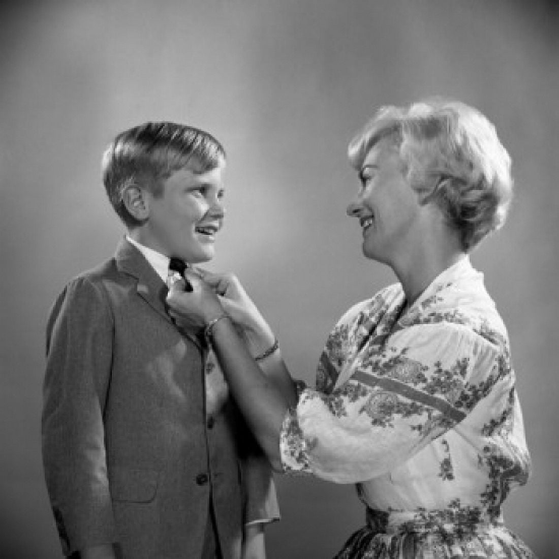 Mother adjusting tie to son Canvas Art - (24 x 36)