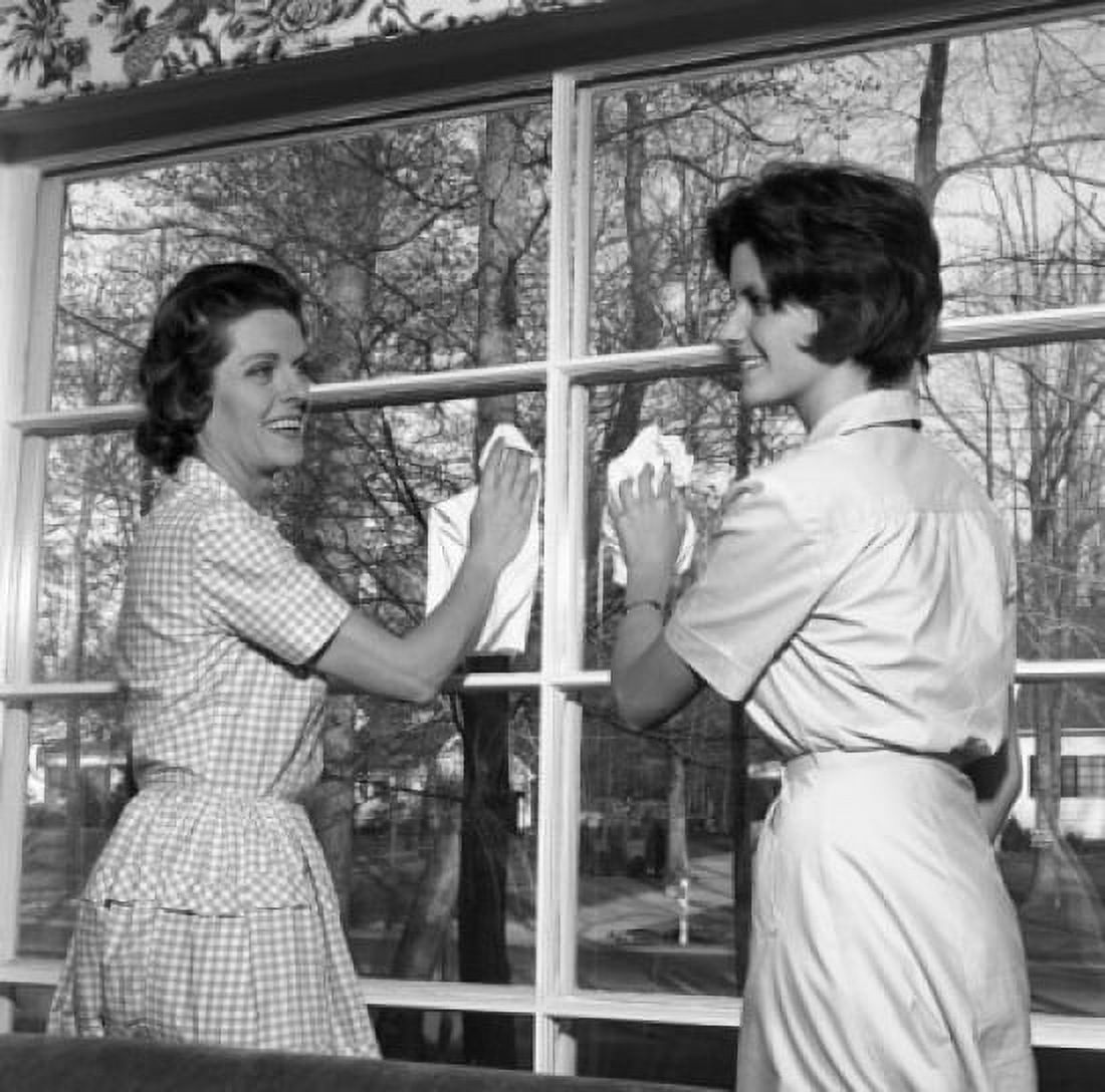 Mother and adult daughter cleaning window Canvas Art - (18 x 24)
