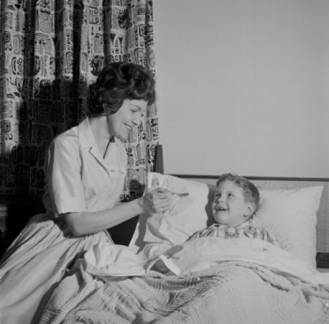 Mother and son going to bed Canvas Art - (24 x 36)