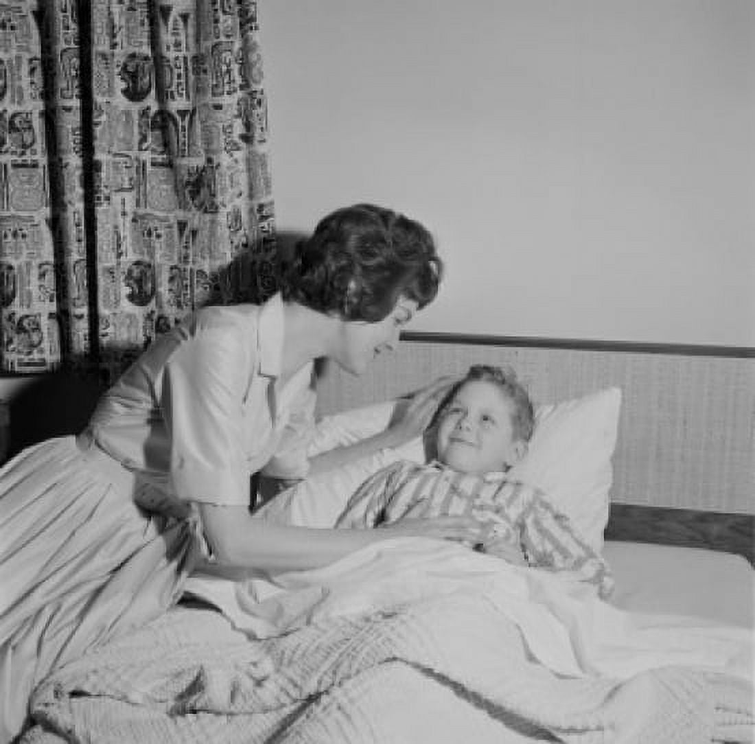 Mother and son going to bed Canvas Art - (24 x 36)