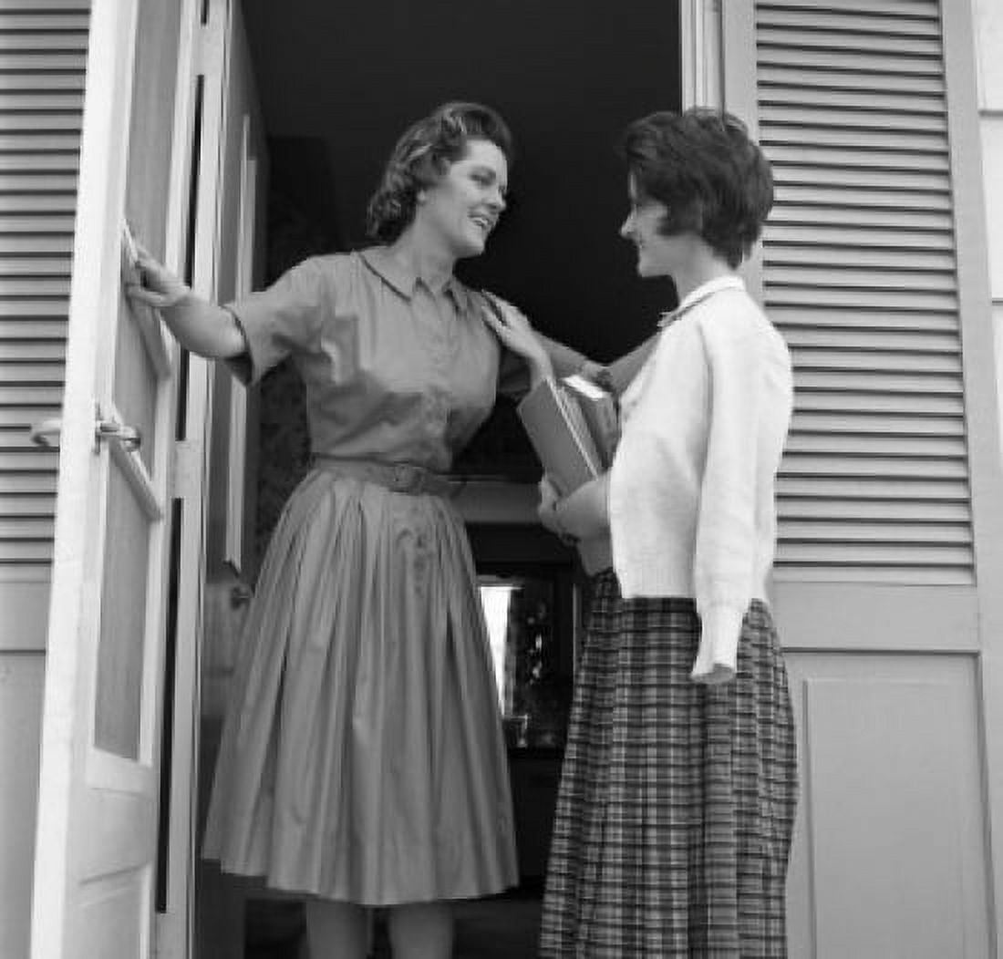 Mother and teenage daughter standing in doorway and talking Canvas Art - (18 x 24)