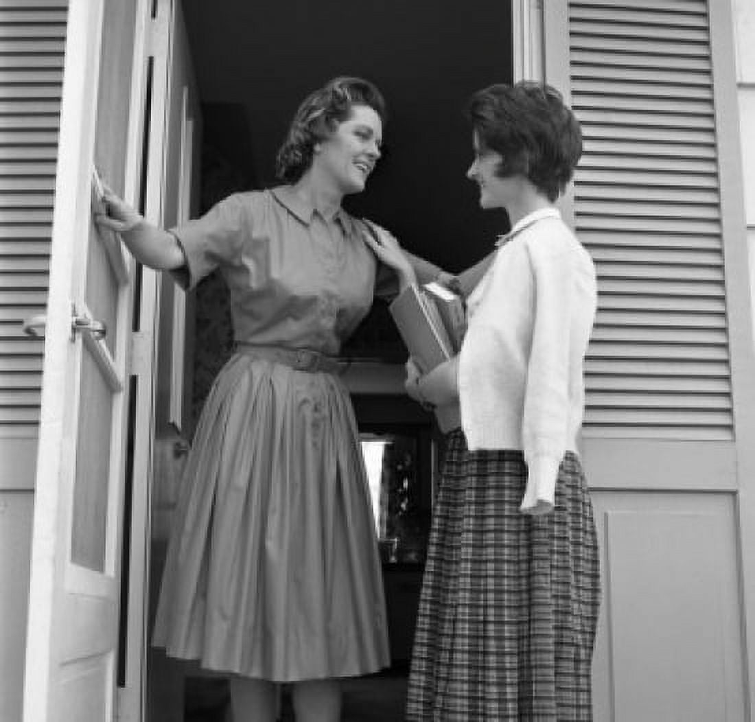 Mother and teenage daughter standing in doorway and talking Canvas Art - (24 x 36)