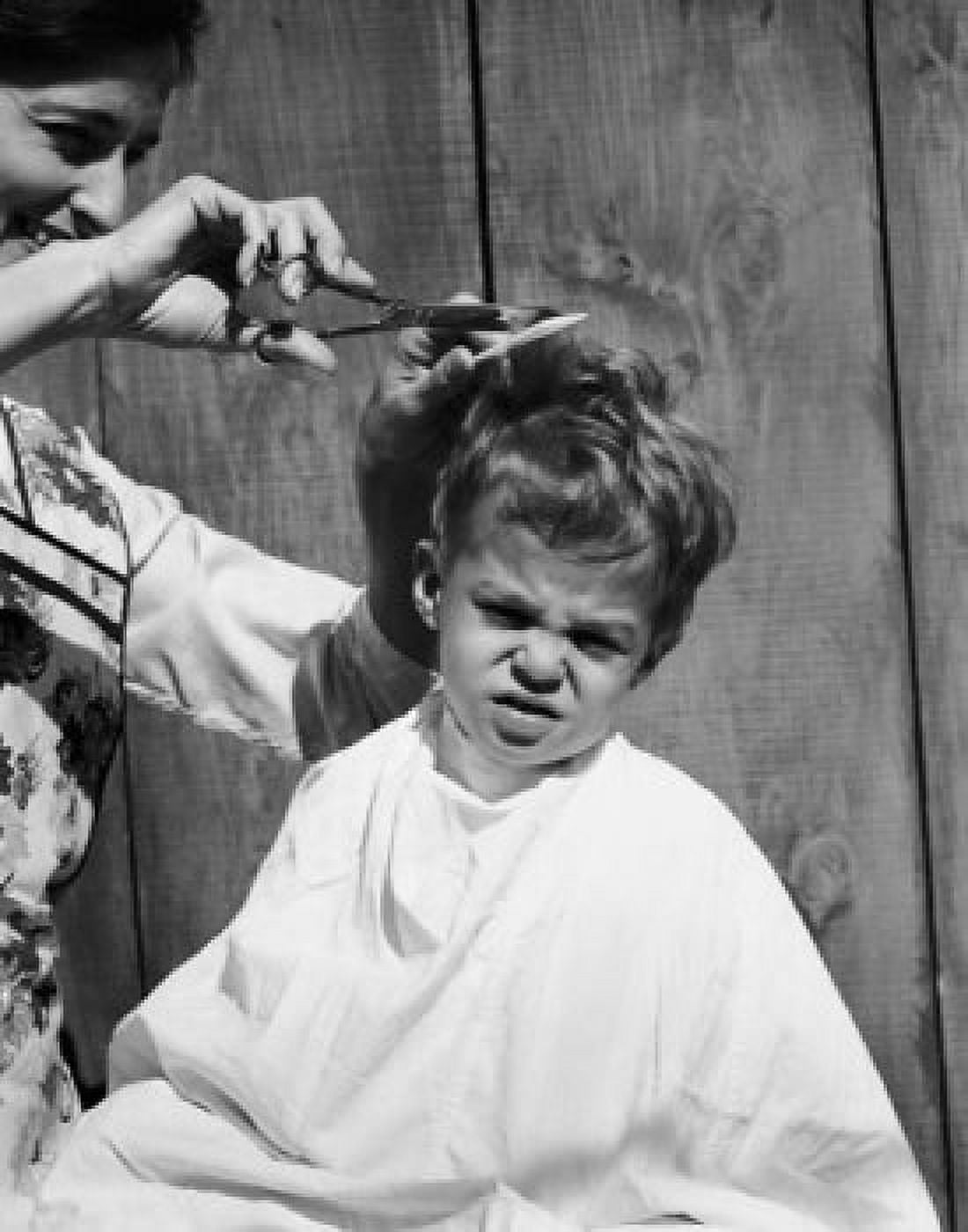Mother cutting her sons hair Canvas Art - (24 x 36)