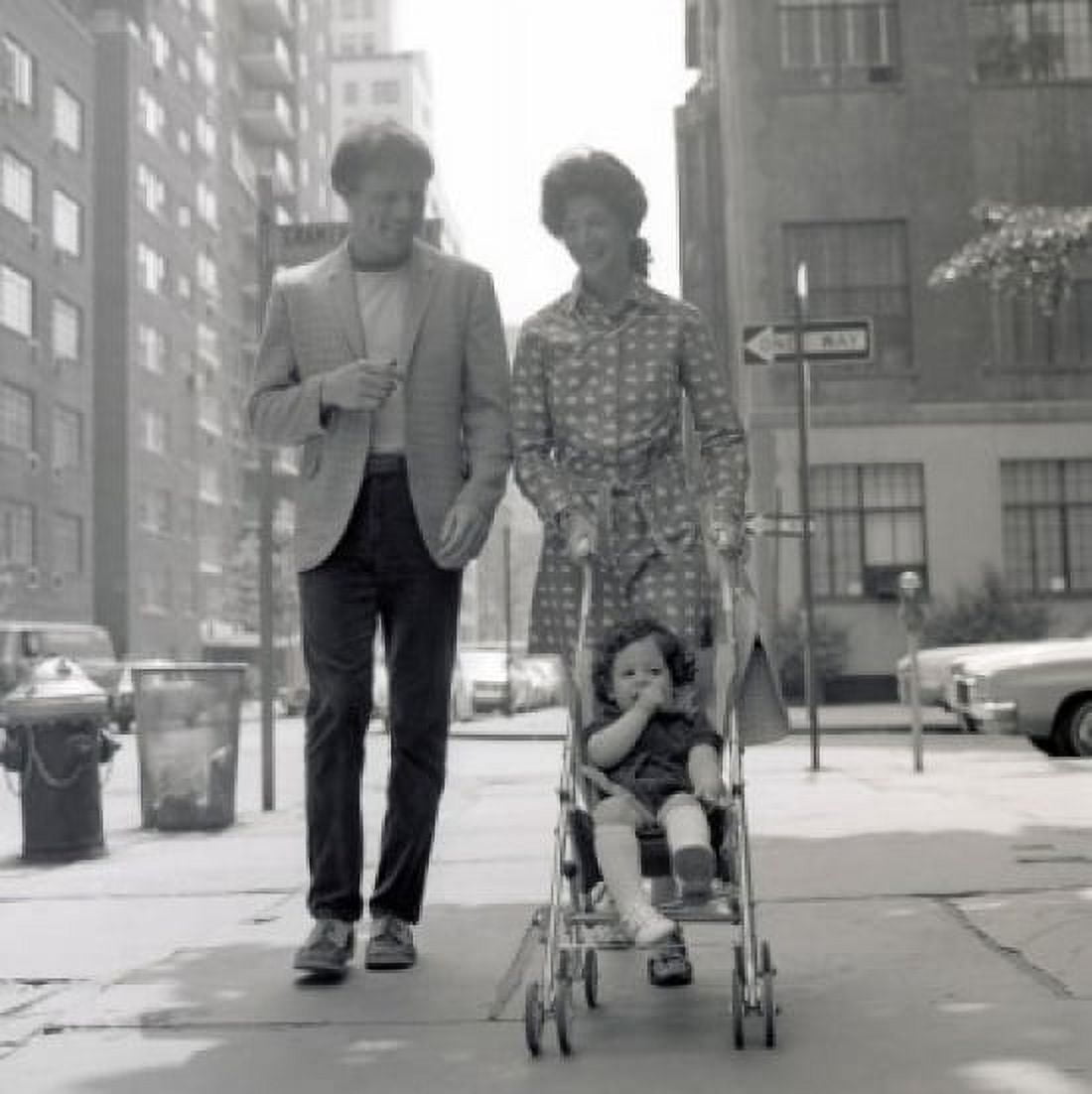 Mother father and baby boy on sidewalk Canvas Art - (18 x 24)