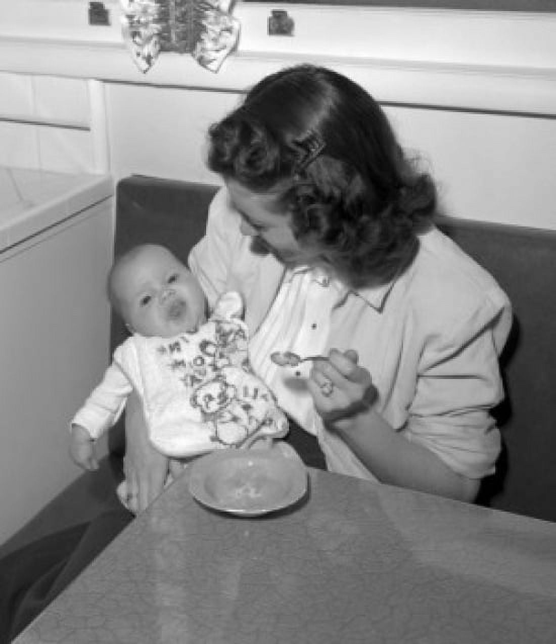 Mother feeding baby Canvas Art - (18 x 24)