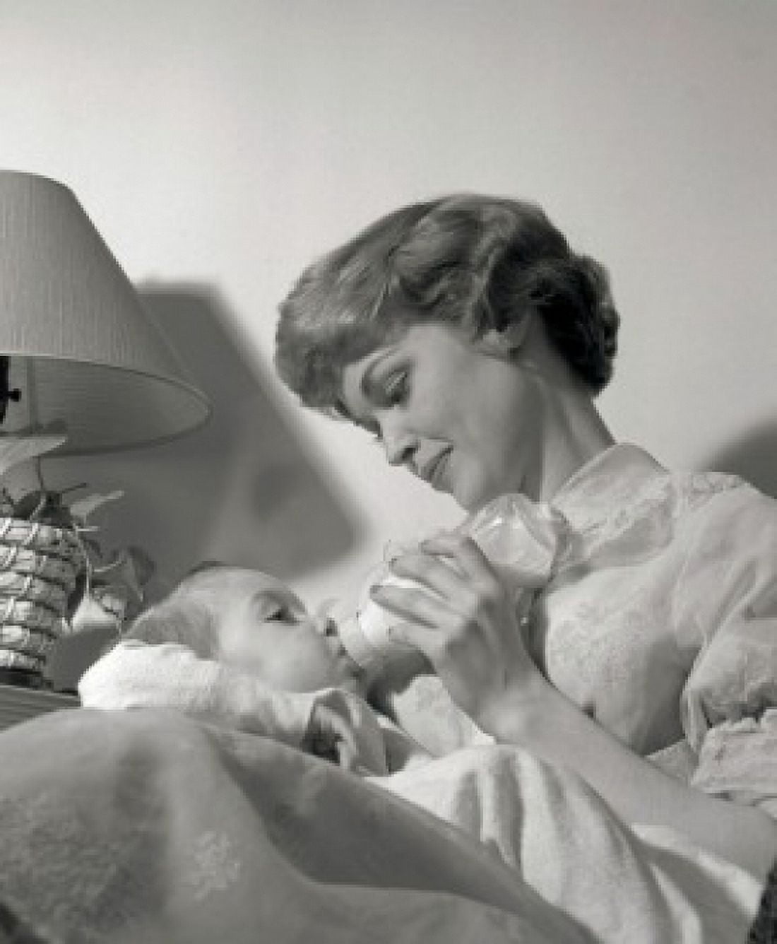Mother feeding baby with bottle Canvas Art -  (18 x 24)