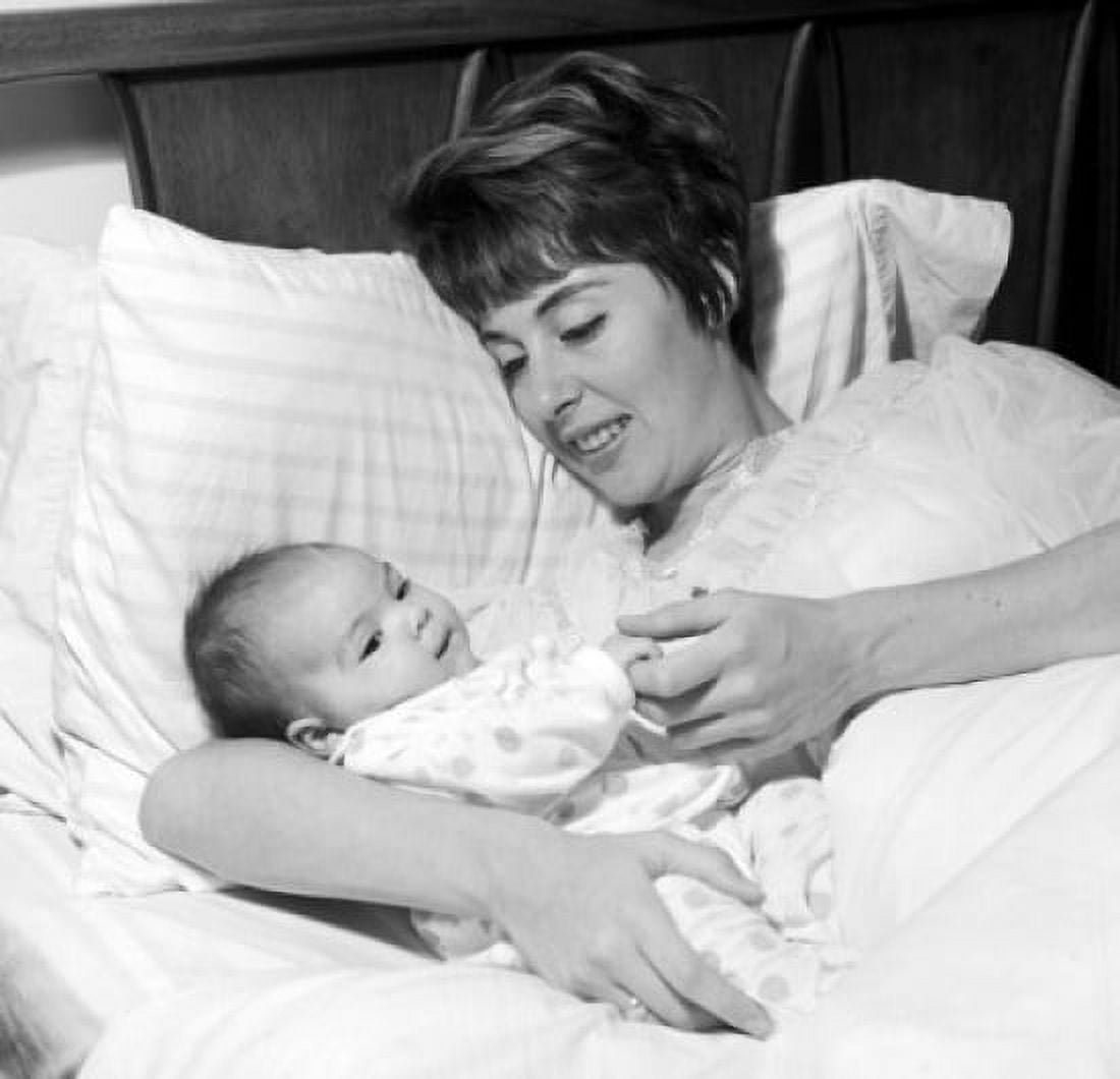 Mother lying in bed with newborn baby Canvas Art - (18 x 24)
