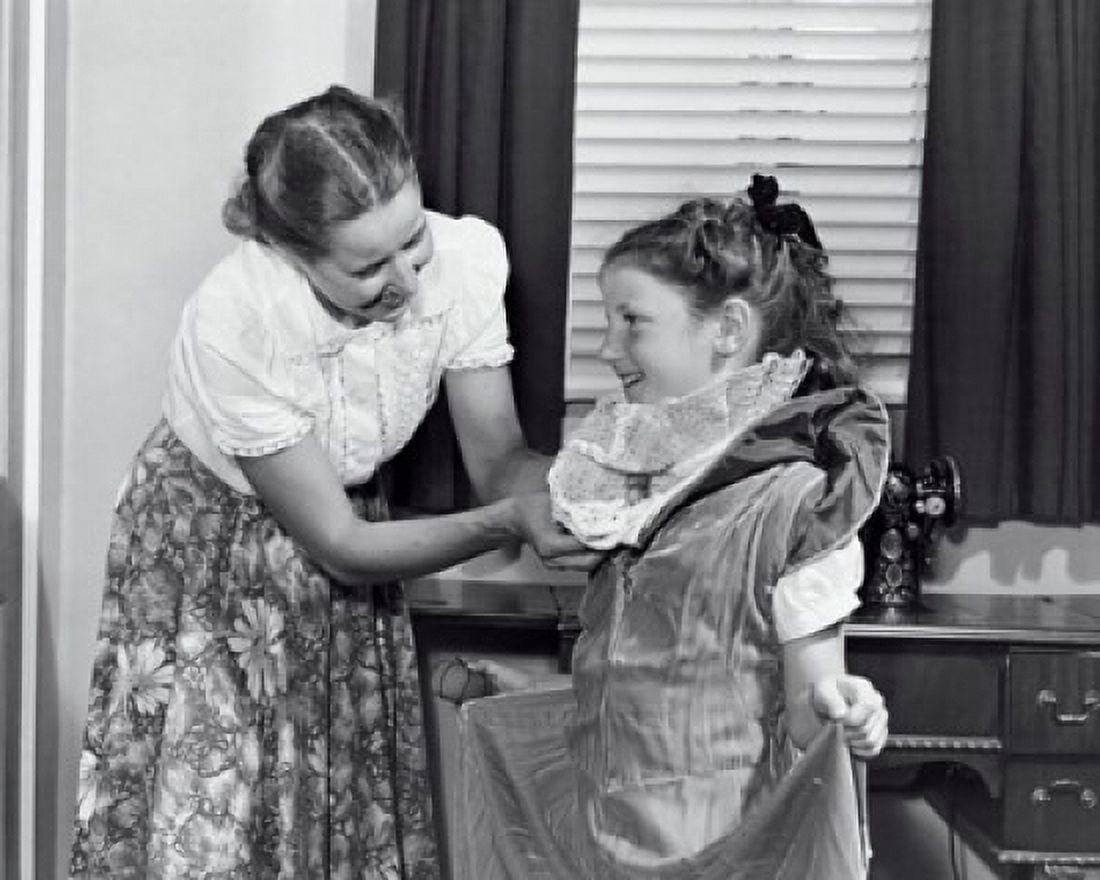 Mother making a dress for her daughter Canvas Art - (18 x 24)