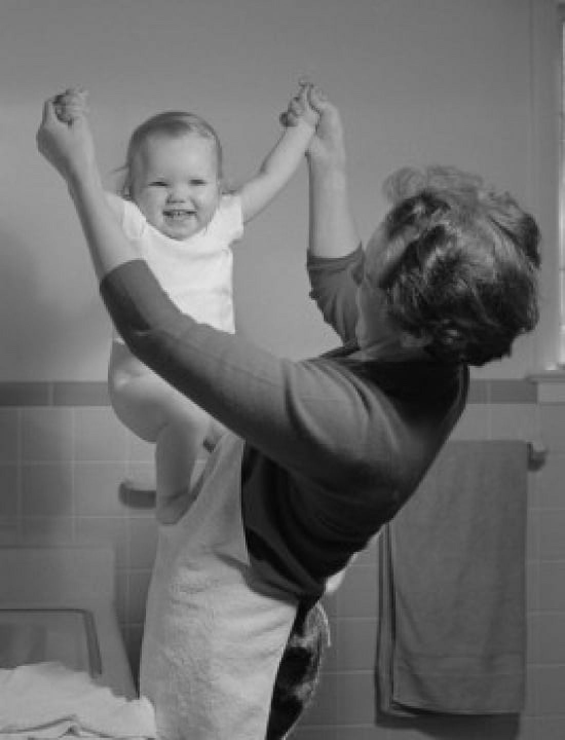 Mother playing with baby girl in bathroom Canvas Art - (18 x 24)
