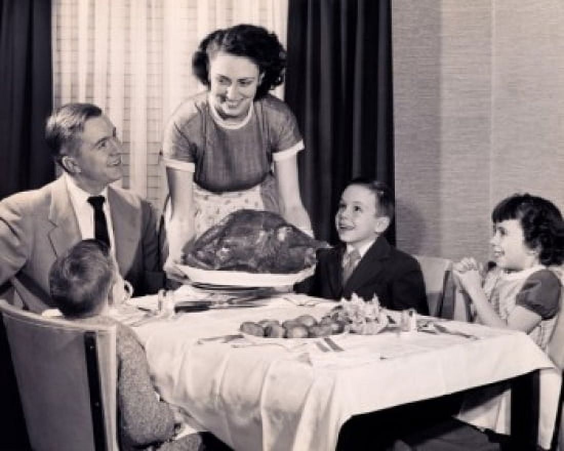 Mother serving a turkey on a platter Canvas Art - (24 x 36)