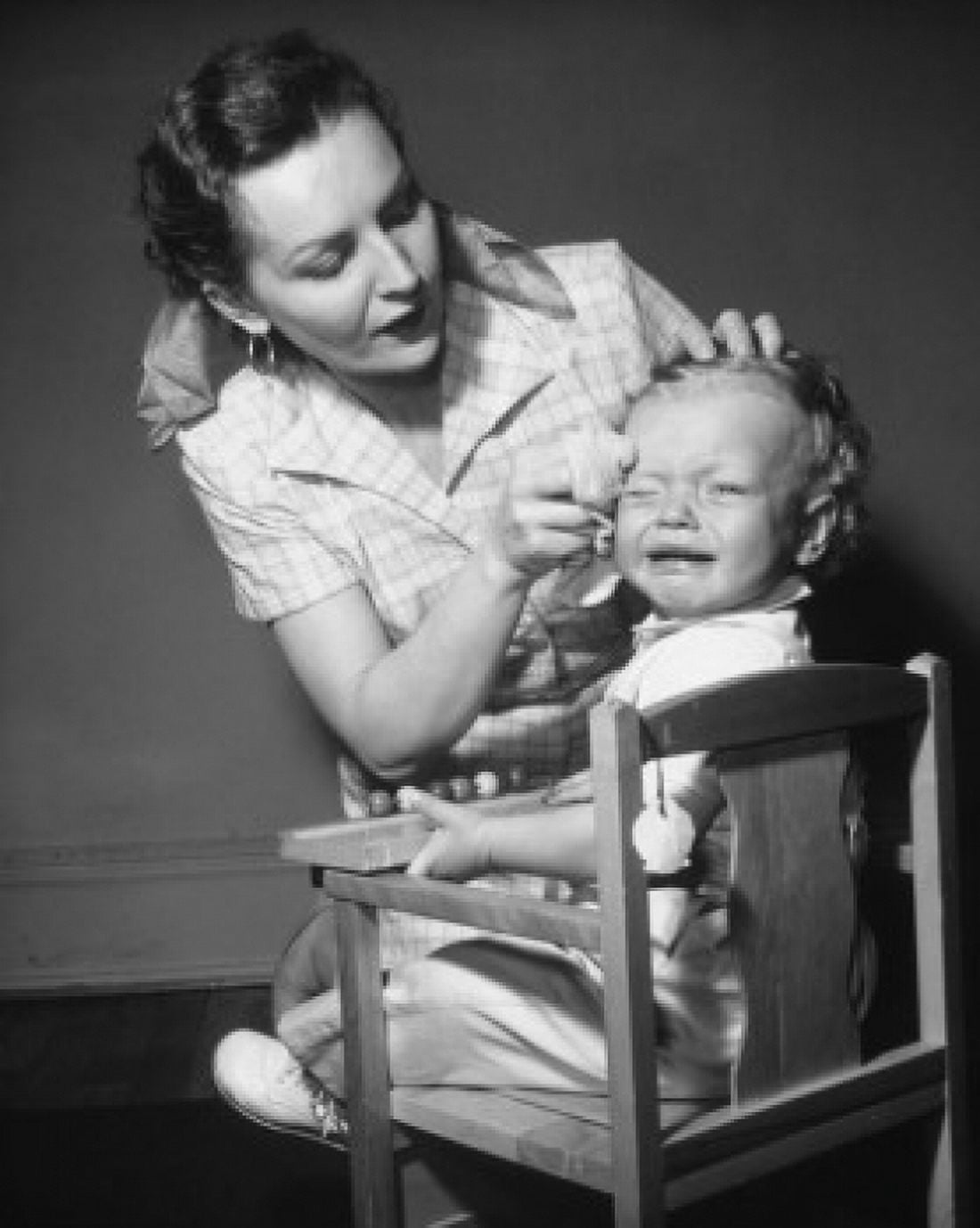 Mother wiping her sons forehead Canvas Art - (24 x 36)