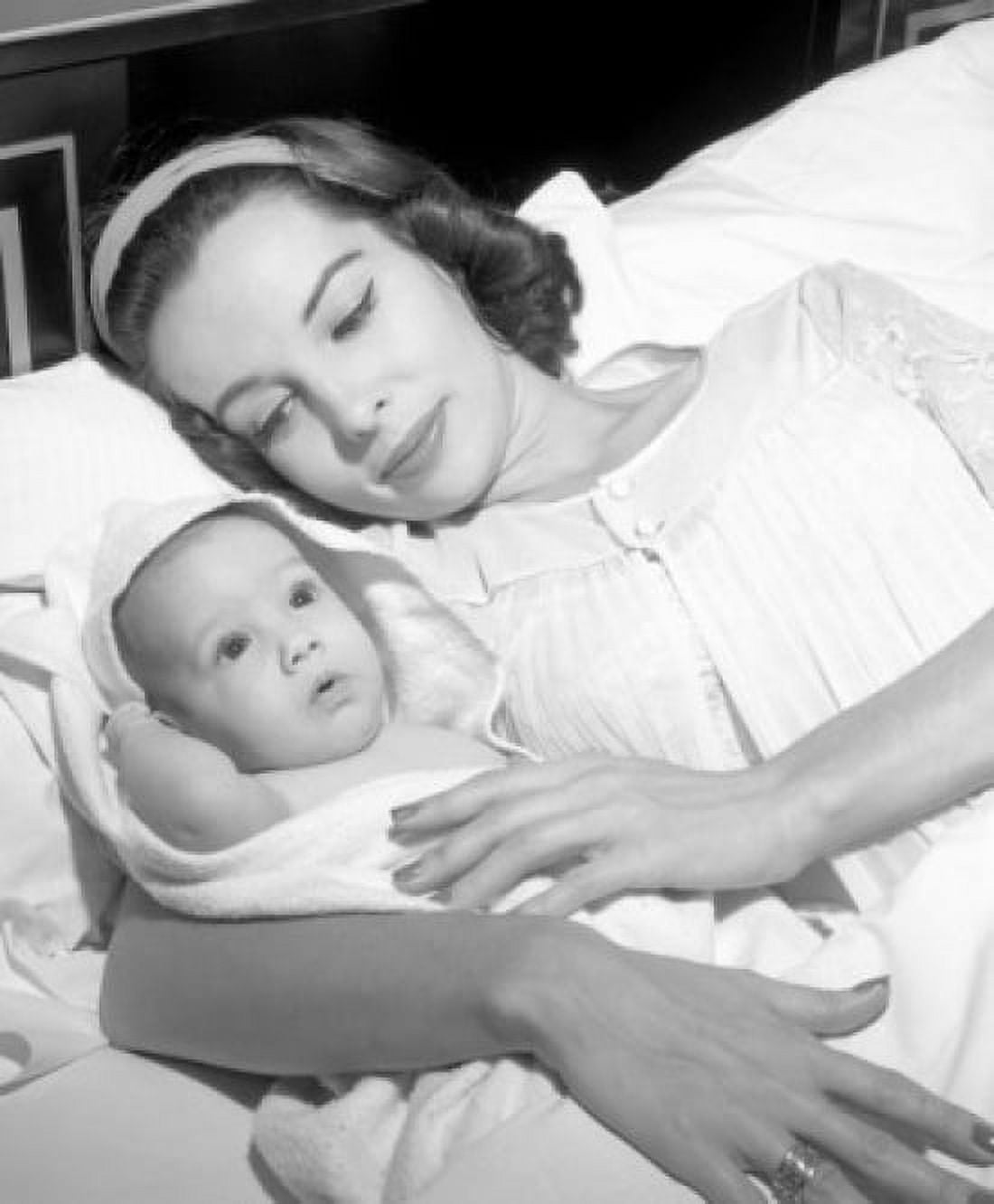 Mother with baby in bed Canvas Art - (18 x 24)