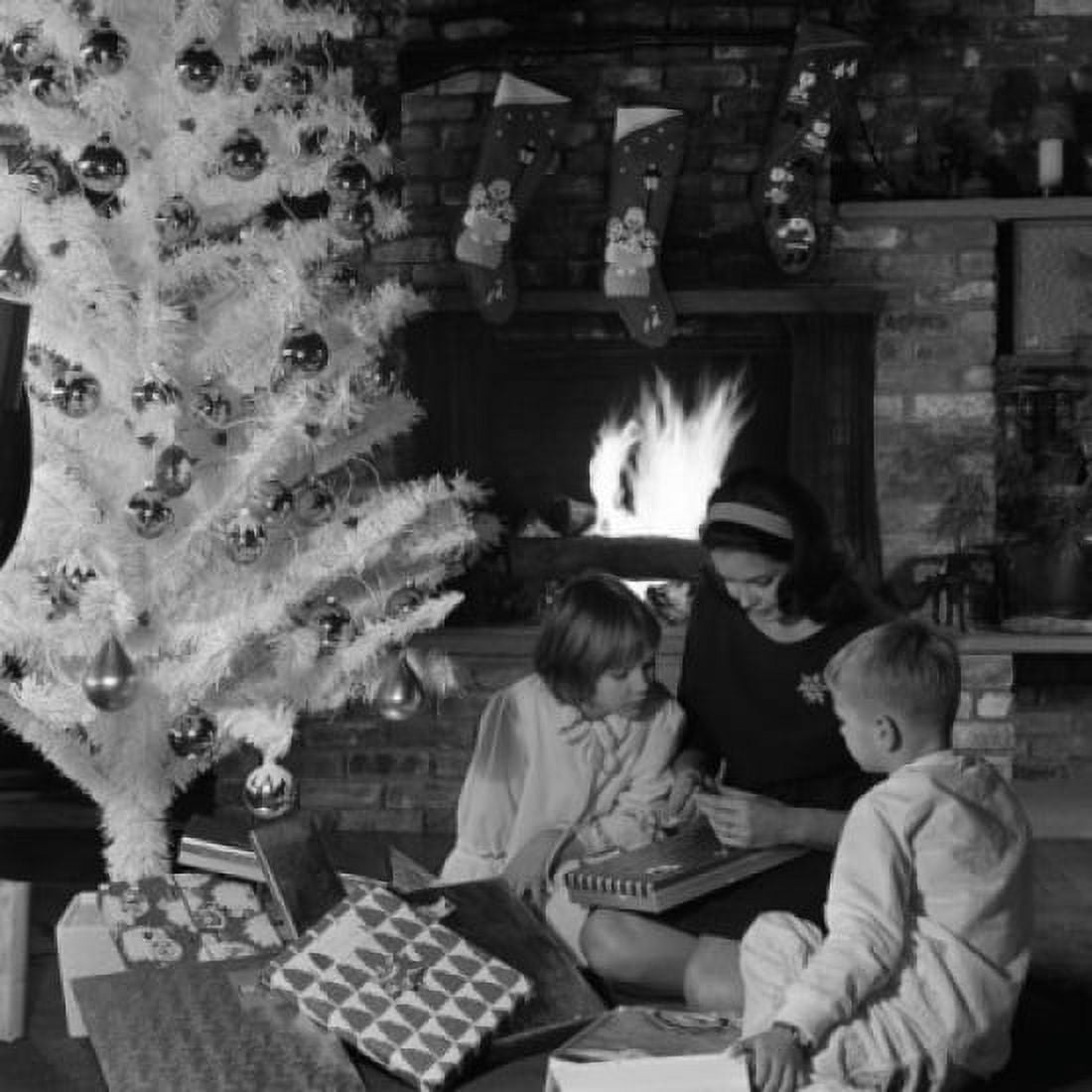 Mother with children unpacking Christmas gifts Canvas Art - (18 x 24)