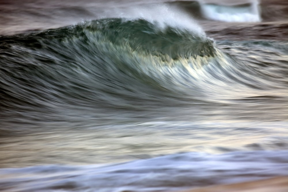 Motion blur of breaking wave Hawaii United States of America Canvas Art - Vince Cavataio Design Pics (19 x 12)