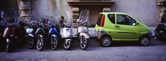 Motor scooters with a car parked in a street Florence Italy Canvas Art - Panoramic Images (36 x 13)