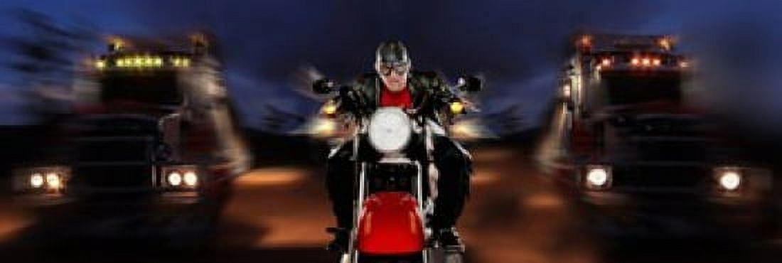 Motorcycle rider between two semi trucks Canvas Art - Panoramic Images (36 x 12)
