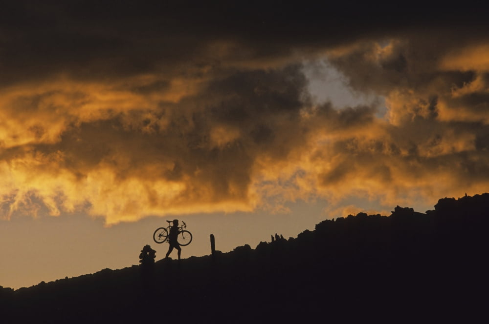 Mountain Biker Carries Bike Up Rocky Slope Sunset Clouds Behind Whistler Bc Canada Canvas Art - Leanna Rathkelly Design Pics (17 x 11)