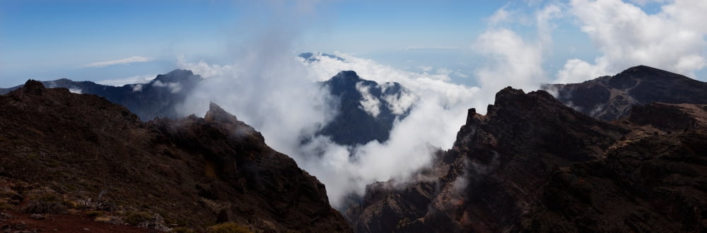 Mountain peak surrounded with clouds Caldera de Taburiente National Park La Palma Canary Islands Spain Canvas Art - Panoramic Images (36 x 12)