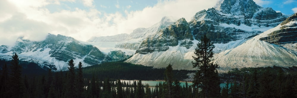 Mountain range at the lakeside Crowfoot Glacier Banff National Park Alberta Canada Canvas Art - Panoramic Images (6 x 18)