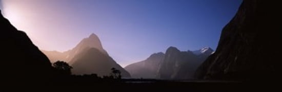 Mountain range at waters edge Milford Sound Fiordland National Park South Island New Zealand Canvas Art - Panoramic Images (36 x 12)