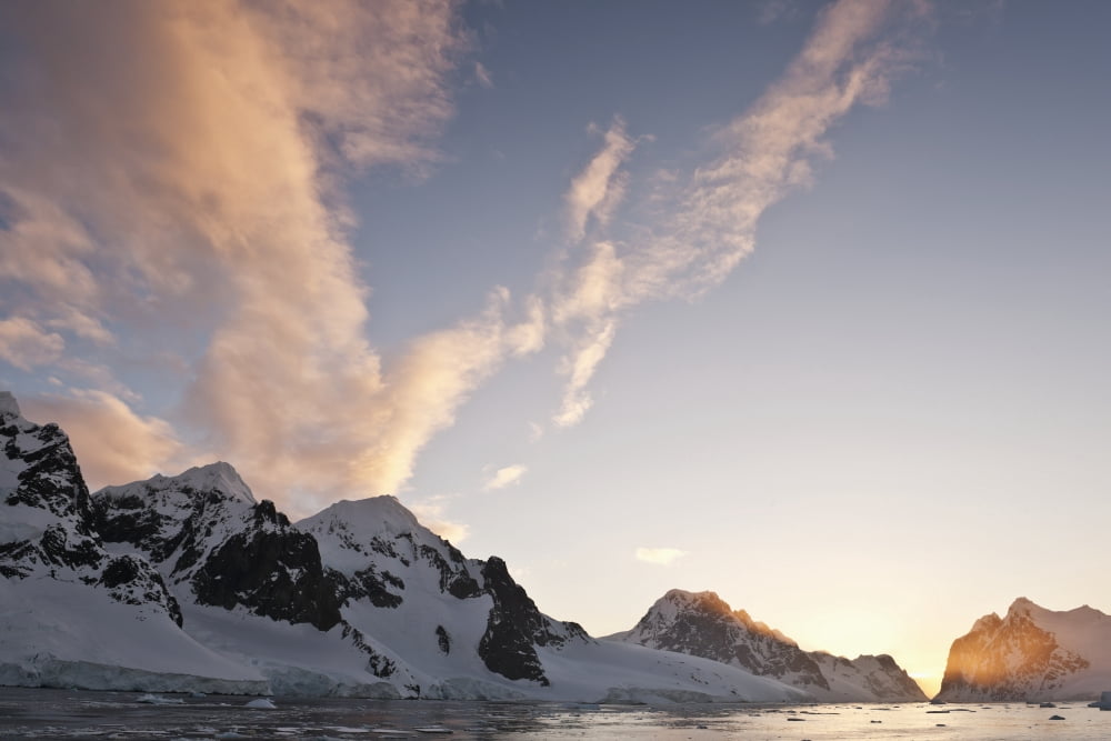 Mountain range covered by glaciers in the Lemaire Channel at sunset Antarctic Peninsula Canvas Art - Daisy Gilardini Design Pics (38 x 24)