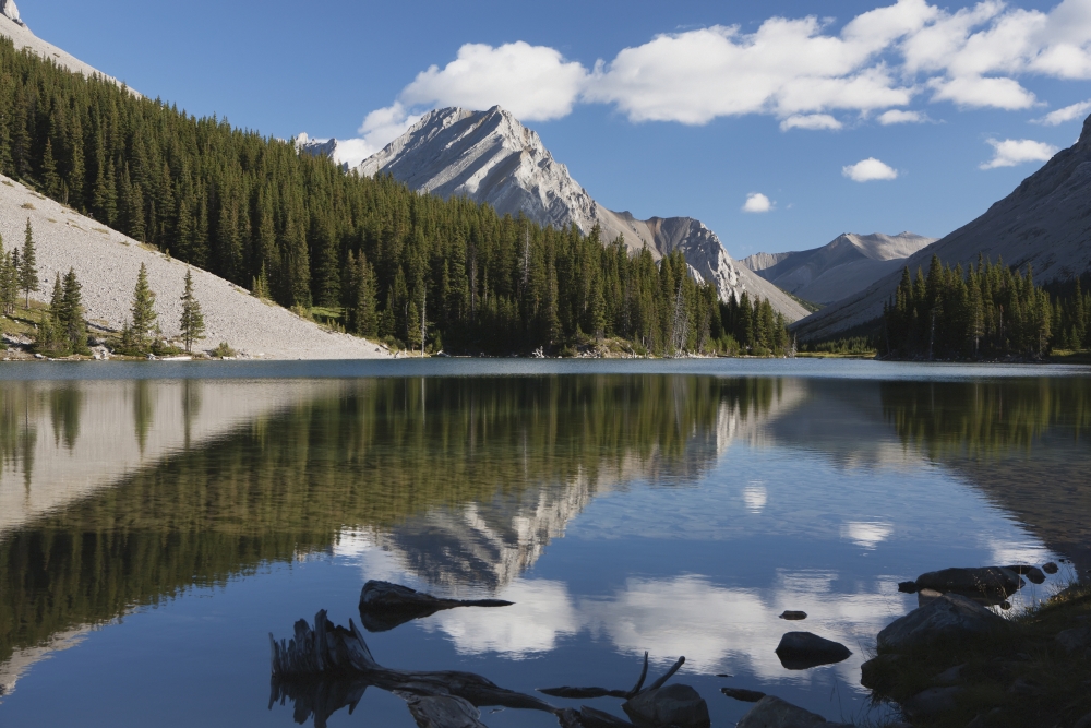 Mountain reflecting in lake with blue sky and clouds in kananaskis provincial parkAlberta canada Canvas Art - Michael Interisano Design Pics (38 x 24)