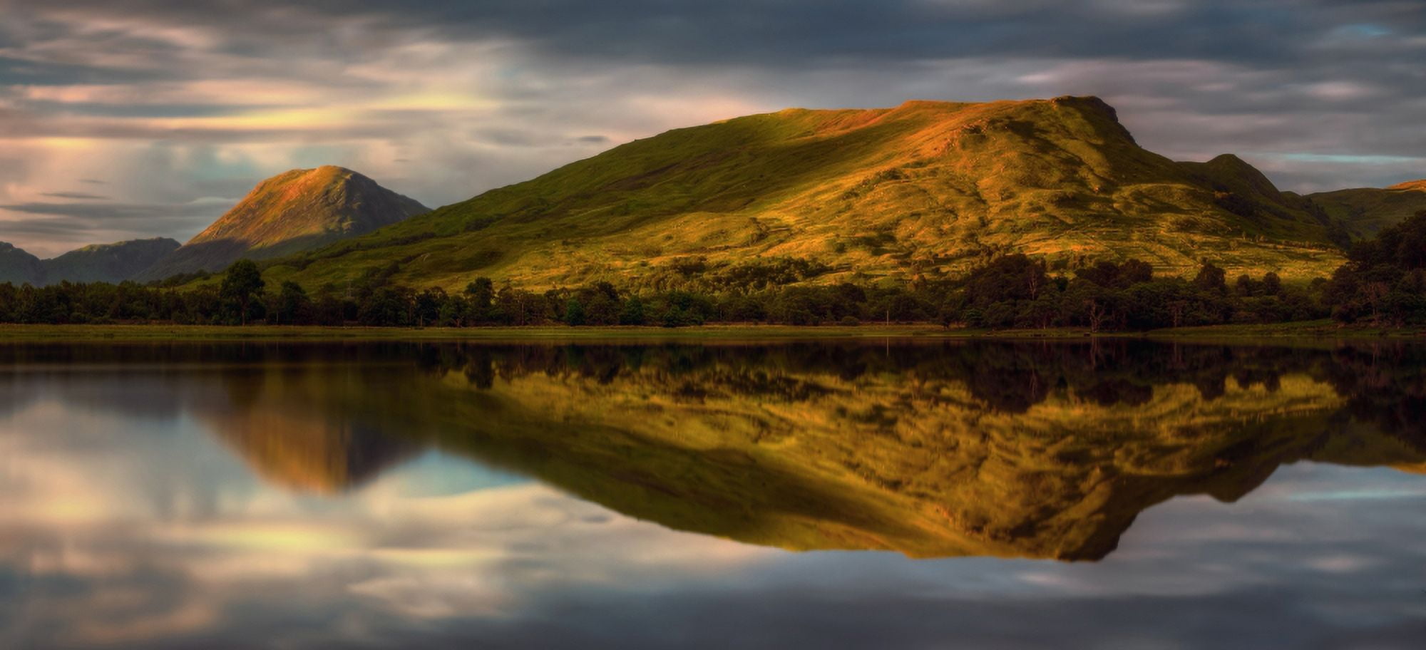 Mountain reflection in Loch Awe at sunset Argyll and Bute Scottish Highlands Scotland Canvas Art - Panoramic Images (14 x 30)