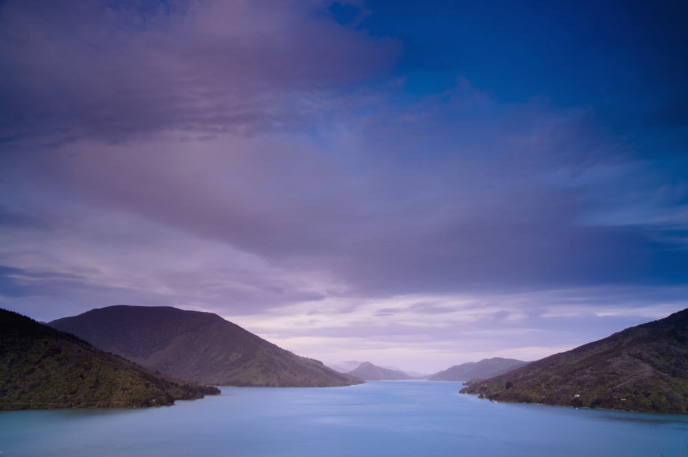 Mountains Along The Coastline Under A Cloudy Sky Havelock South Island New Zealand Canvas Art - David DuChemin Design Pics (38 x 24)