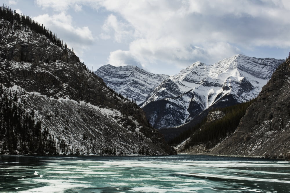Mountains and frozen lake in winter Bow Valley Wildland Alberta Canada Canvas Art - Gillian Williamson Design Pics (38 x 24)