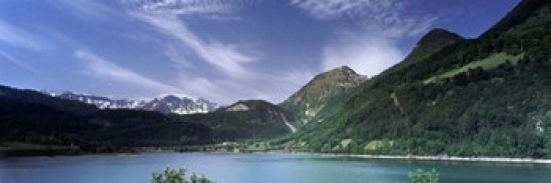 Mountains at the lakeside Lungerersee Lungern Obwalden Canton Switzerland Canvas Art - Panoramic Images (18 x 6)