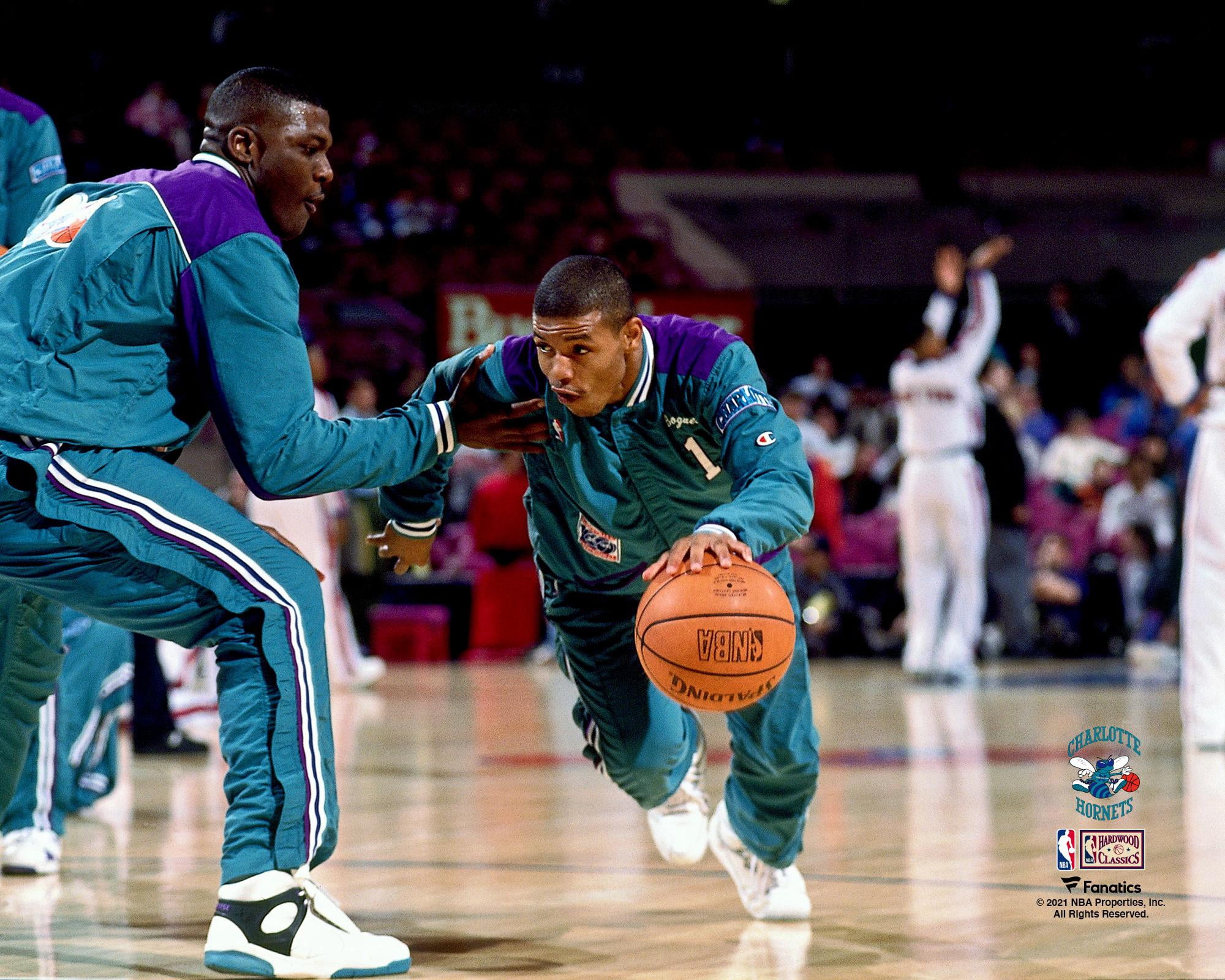 Muggsy Bogues Charlotte Hornets Unsigned Warming Up With Larry Johnson ...