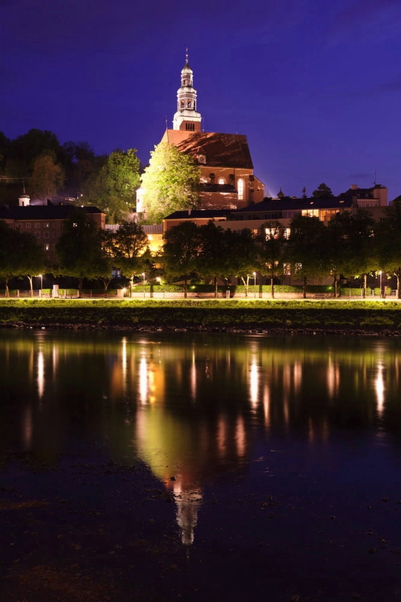 Mullner Kirche church reflecting in Salzach river Salzburg Salzburger Land Austria Canvas Art - Panoramic Images (27 x 9)